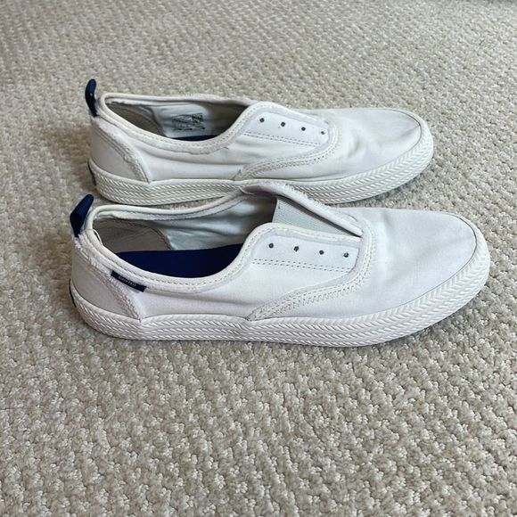 sperry white slip on sneakers